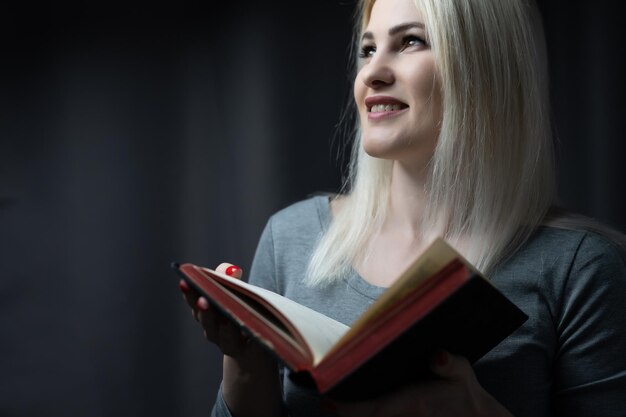 Woman reading the Holy Bible, Reading a book.