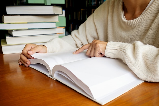 woman reading in a library