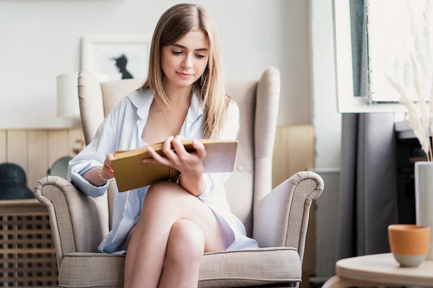 Woman reading a novel relax at home Quarantine Indoor lifestyle Leisure indoors entertainment