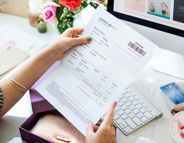 Woman reading payment  bill