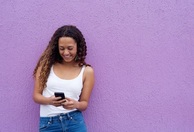 Woman reading a text message on mobile phone