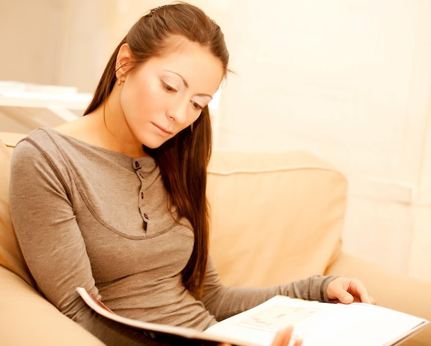 Woman reads a magazine