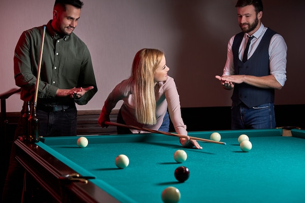 Friends Cheering While Their Friend Aiming For Billiards Ball Stock Photo,  Picture and Royalty Free Image. Image 28035174.