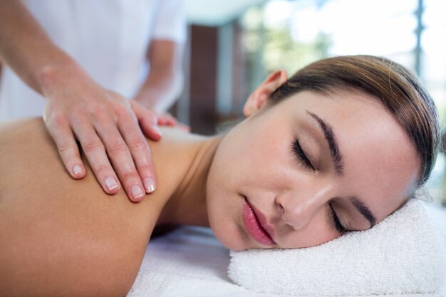 Woman receiving a back massage