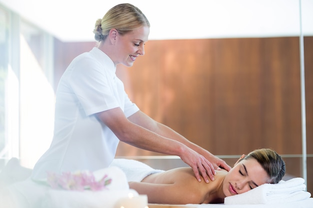 Woman receiving a back massage