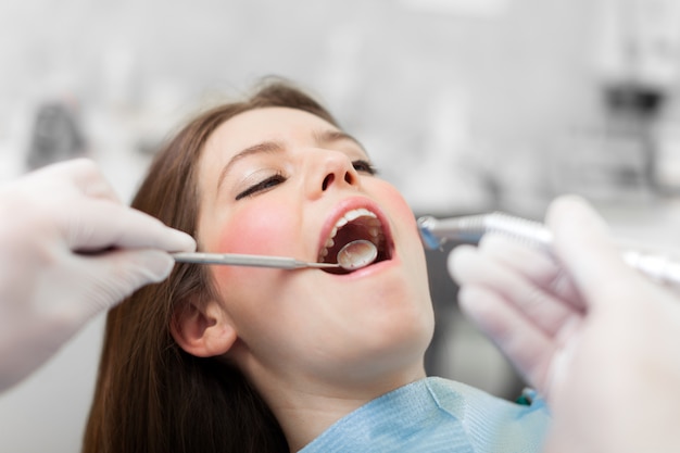 Woman receiving a dental treatment