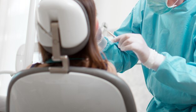 Woman receiving a dental treatment