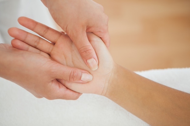 Woman receiving a hand massage 