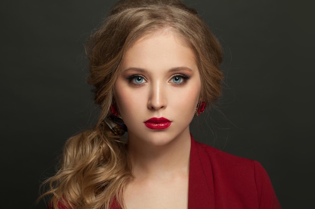 Woman in red on black background