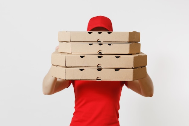 Woman in red cap, t-shirt giving food order pizza boxes isolated on white background. Female pizzaman working as courier or dealer holding italian pizza in cardboard flatbox. Delivery service concept.