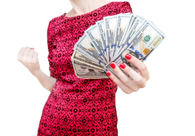 Woman in red dress holding dollar bills and gesturing win