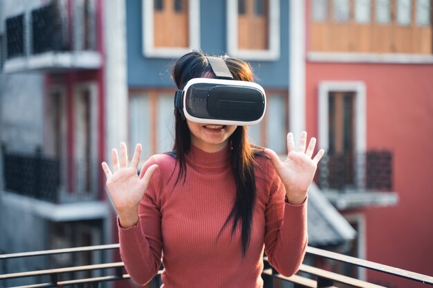 Woman in red shirts with virtual reality headset