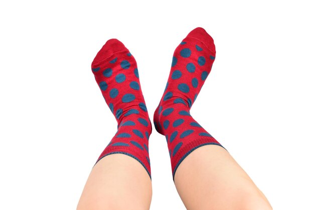 Woman in red socks isolated on white background Top view