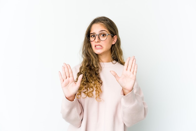 woman rejecting someone showing a gesture of disgust