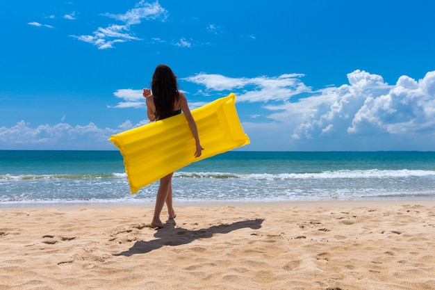 Woman relaxes on beach