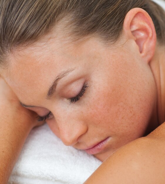 Woman relaxing in a spa center 