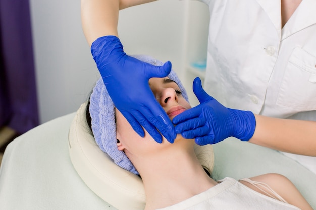 woman relaxing with a face massage