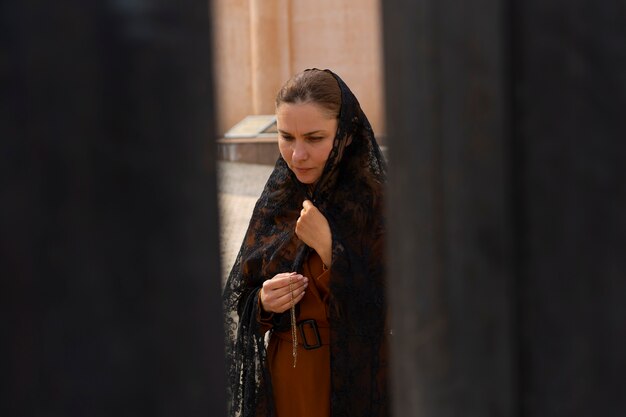 Woman during religious pilgrimage at the church