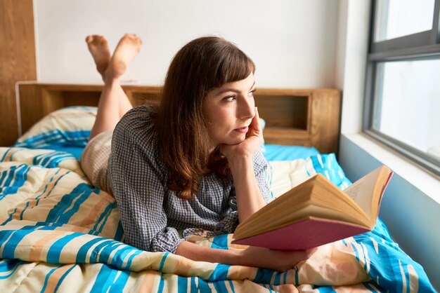 Woman resting in bedroom