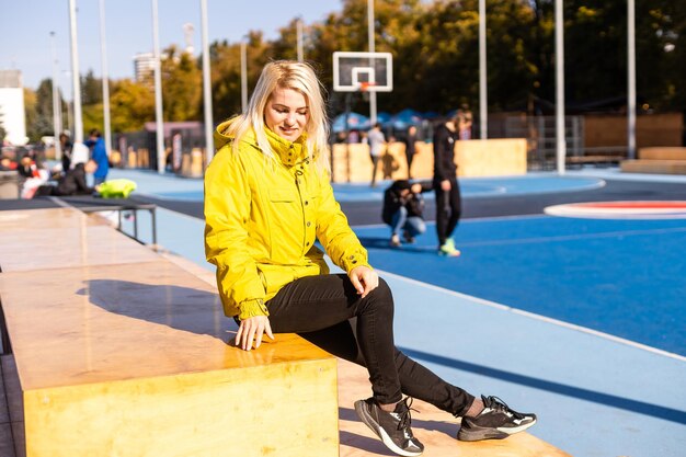 woman resting on the sports ground