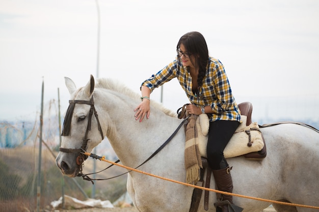 Woman riding a horse