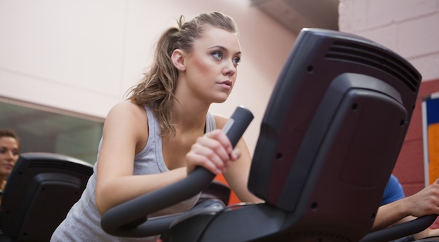 Woman riding in a spinning class