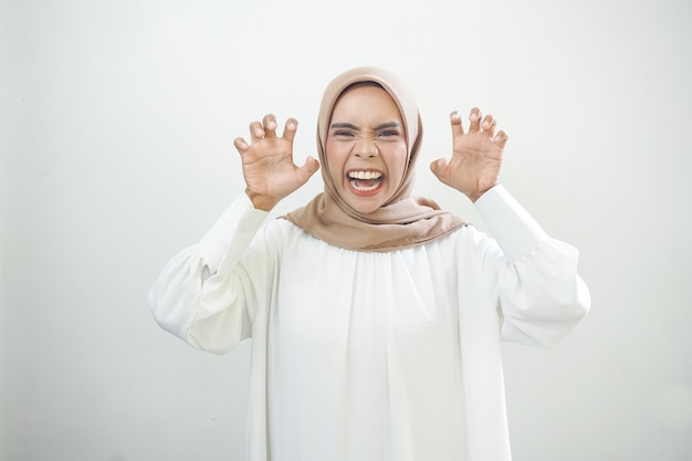 Woman roar Overjoyed beautiful Asian woman in casual shirt celebrating big luck and success