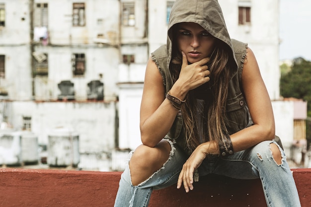 Woman on the roof of old building