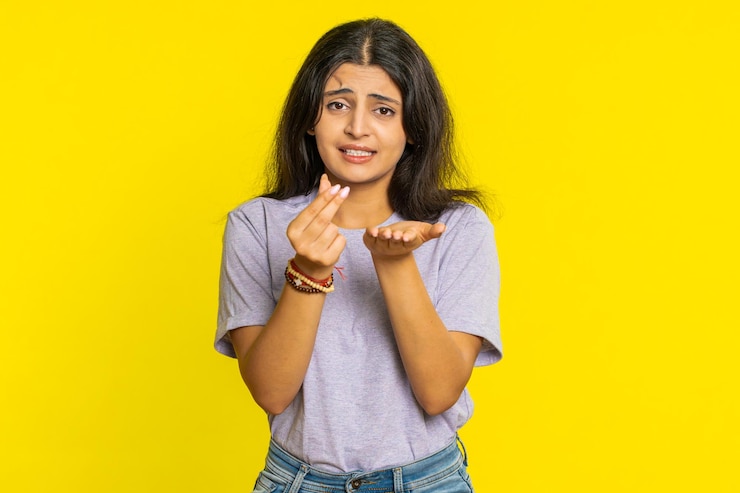 Photo woman rubbing fingers show cash gesture demands to pay back the debt take loan do shopping begging