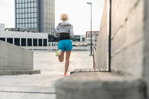 Woman running in the city