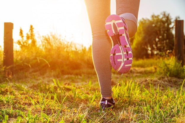 Woman running in a field