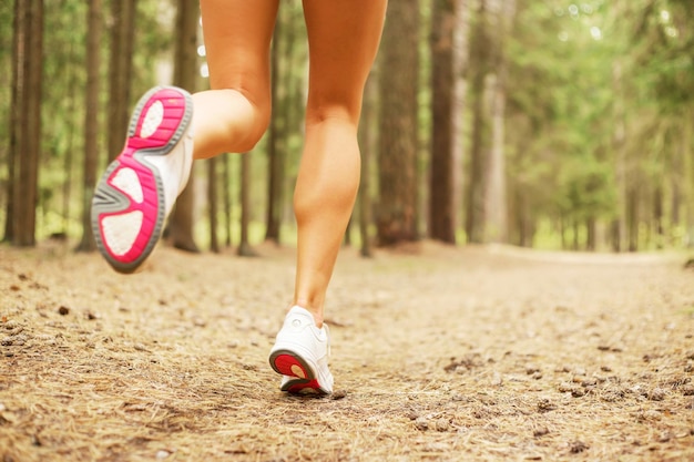 Woman running in the forest