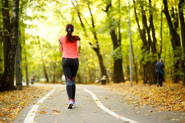 Woman running in park