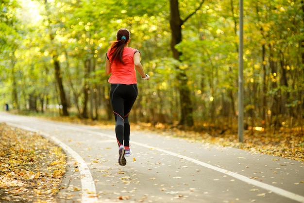 Woman running in park