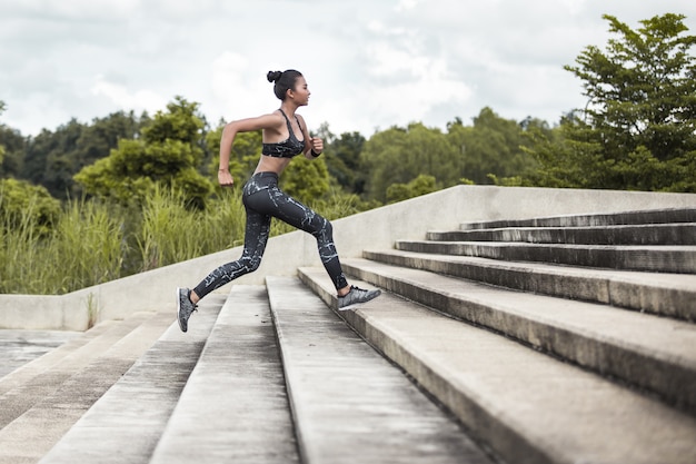 Woman running upstairs