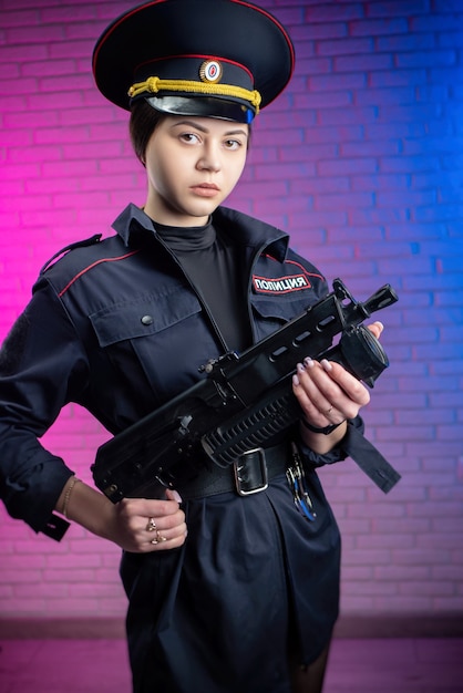 A woman in a Russian police uniform with handcuffs English translation Police