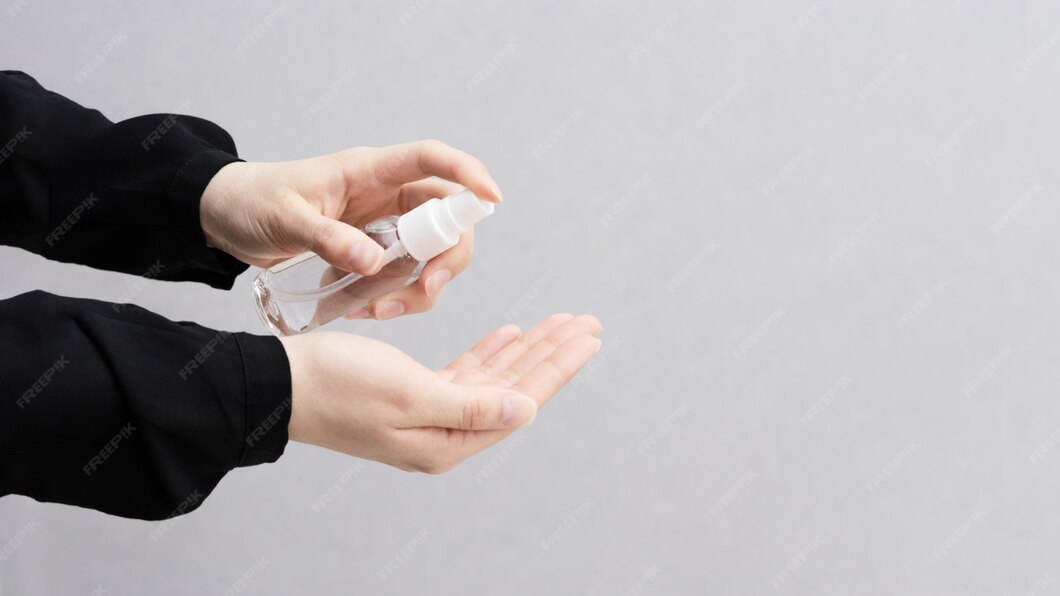 Premium Photo | Woman's hand using antibacterial gel