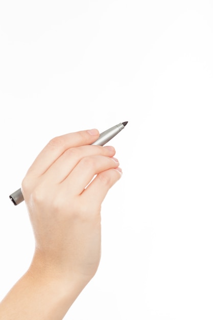 Woman's hand with a pen or marker