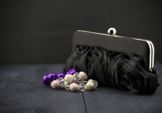 Woman's handbag and bracelets of beads