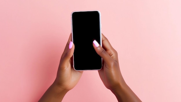 A woman's hands holding a phone with a black screen.