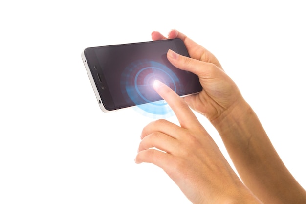 Woman's young hand holding a smartphone with black screen and touching it on white background in studio