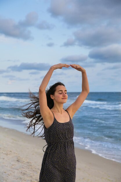 Woman on the sea coast