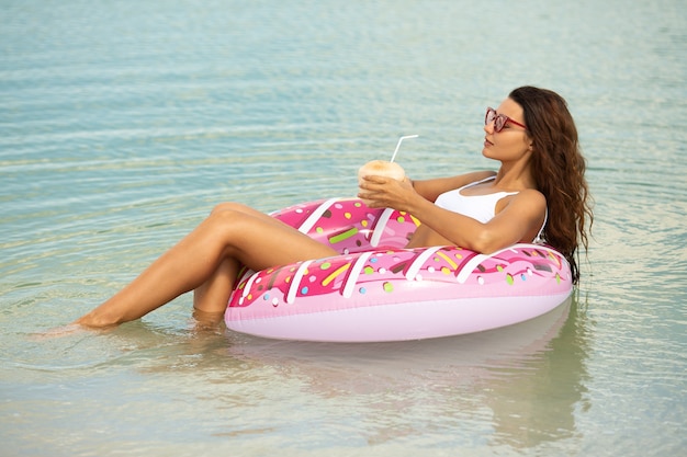 Woman in the Sea on a Rubber Ring.