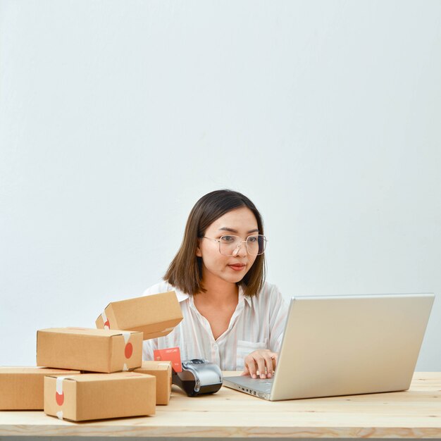 Woman selling products online at home