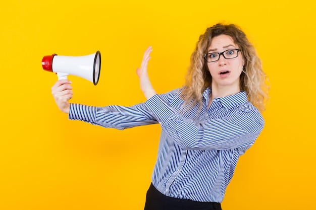 Woman in shirt with loudspeaker