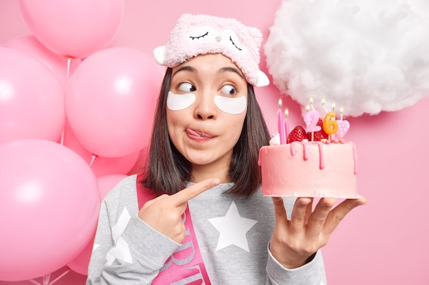 woman shoes which cake she made for her 26th birthday licks lips prepares for party dressed in domestic clothes undergoes skin care procedures