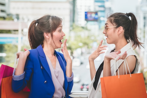 Woman in shopping. Happy woman with shopping bags enjoying in shopping. 