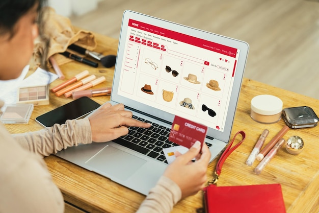 Woman shopping online on internet marketplace browsing for crucial sale items