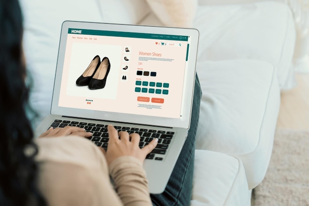 Woman shopping online on internet marketplace browsing for sale items for modern lifestyle and use credit card for online payment from wallet protected by crucial cyber security software