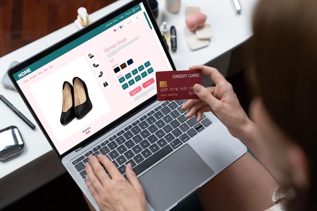 Woman shopping online on internet marketplace browsing for utmost sale items